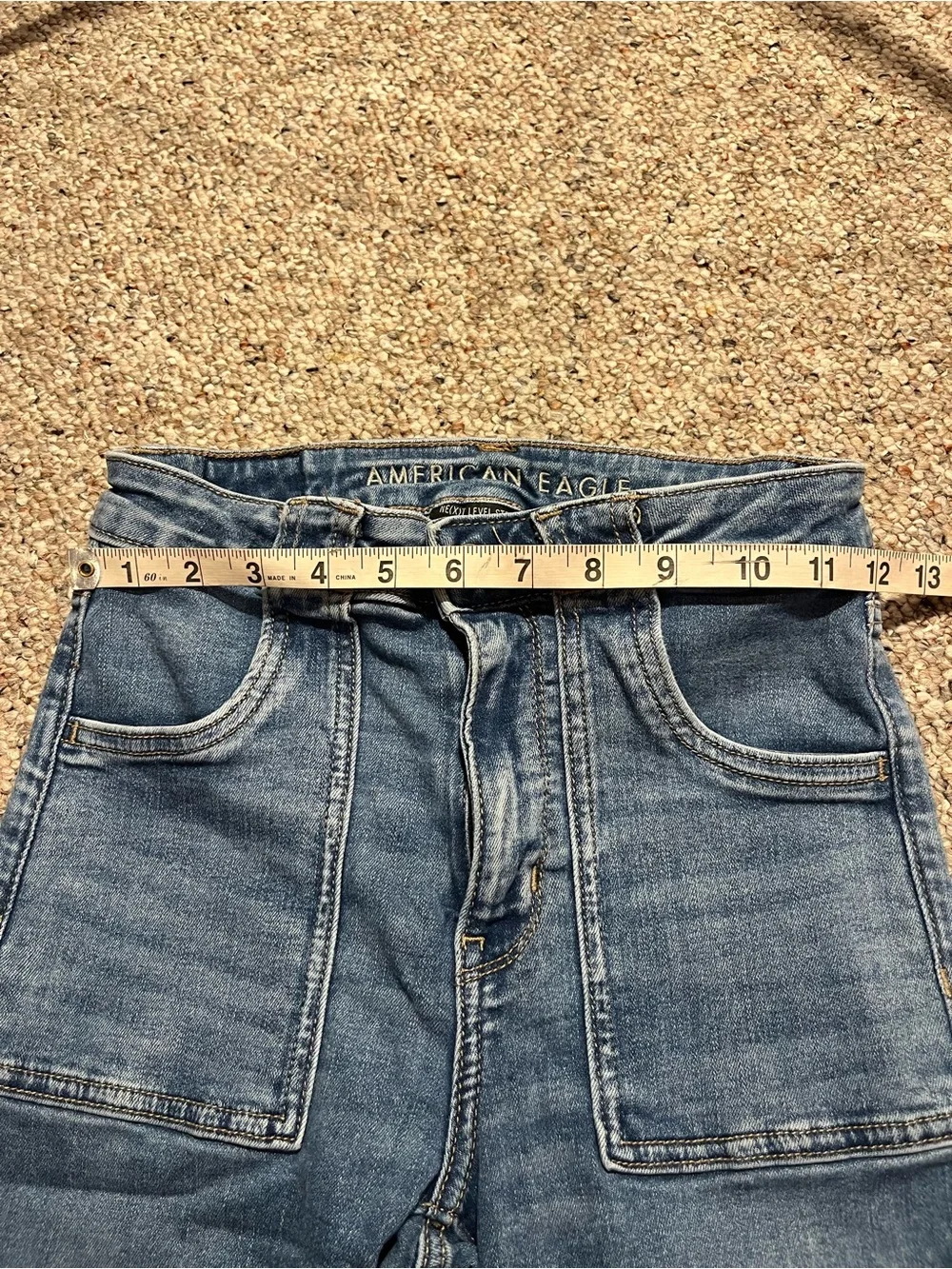 American Eagle Ne(xt) Level Stretch Super High-Rise Flare Blue Jeans - Picture 7 of 11